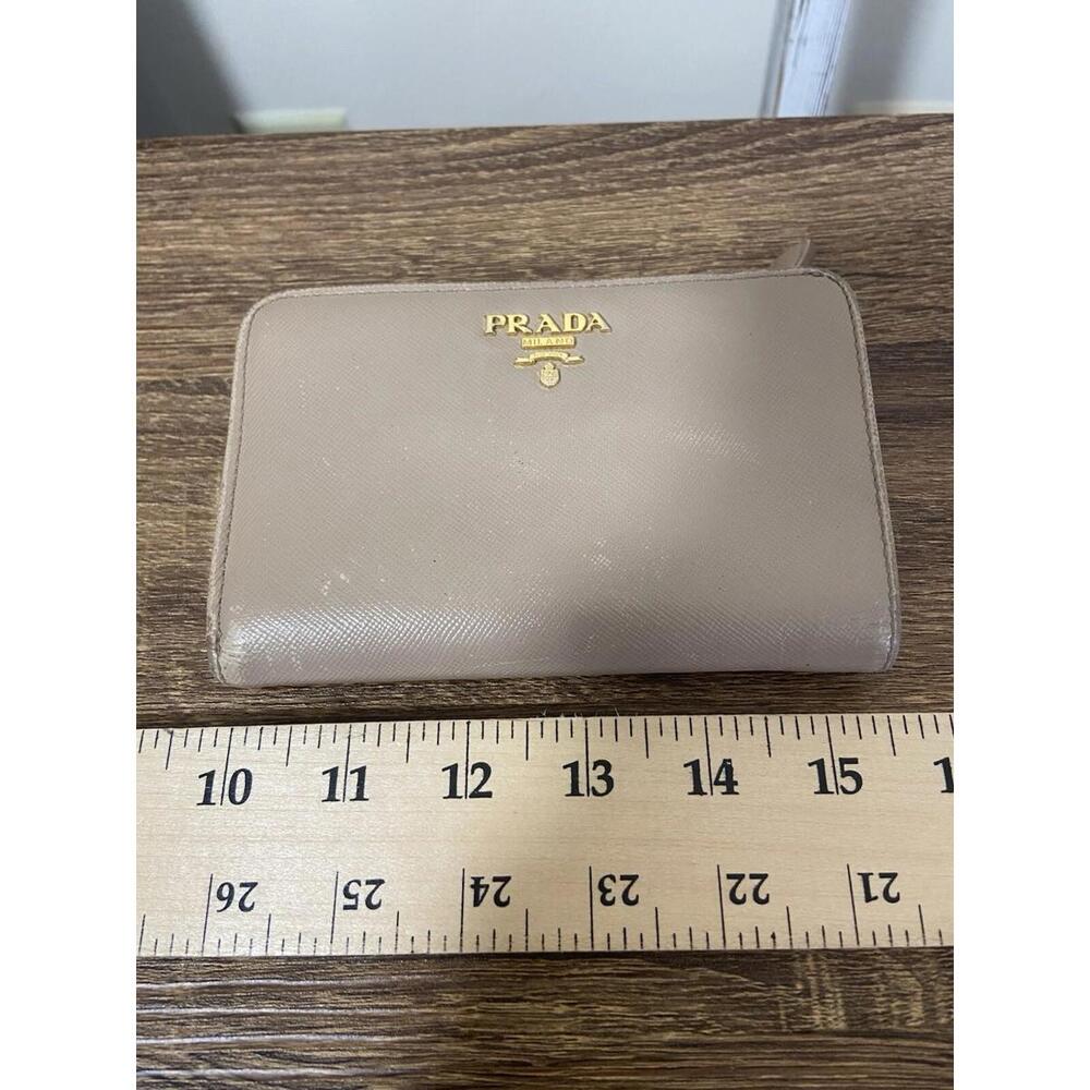 SOLD Prada beige saffiano long zipper bifold wallet, fair cond.